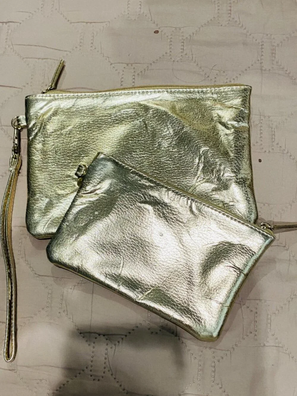 2- Gold metallic clutches with textured crinkled finish